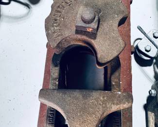 Antique well-pipe holder and clamp