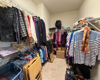 a full closet of ladies' clothing, all sizes (S-XL)