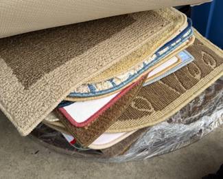A variety of small rugs & mats