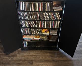 CD storage Cabinet $60.00. 29.5”w 8”d 42”t