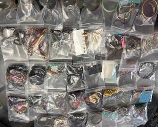 Jewelry: earrings, bracelets, necklaces. Jewelry making supplies, jewelry display pieces, semi precious stones. Some priced individually some by lots.