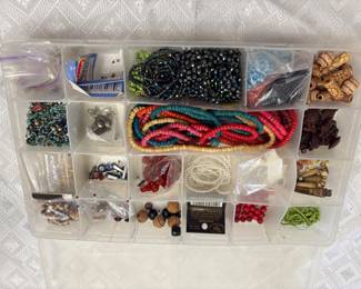 Jewelry: earrings, bracelets, necklaces. Jewelry making supplies, jewelry display pieces, semi precious stones. Some priced individually some by lots.