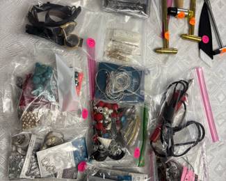 Jewelry: earrings, bracelets, necklaces. Jewelry making supplies, jewelry display pieces, semi precious stones. Some priced individually some by lots.