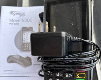 Ingenico Move 5000 credit card acceptance machine with receipt tape rolls. $100.00