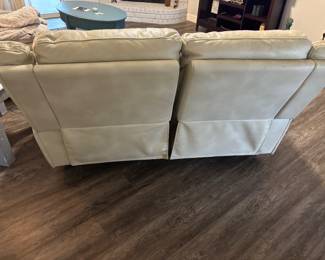 Crème pleather sofa and loveseat $450.00 set. Sofa 88”L 32”d 38”t LS: 64”L 32”d 38”t