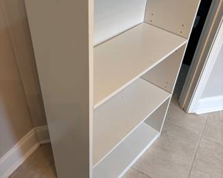 Black and white book cases. $20 each 24.5”w 9.5”d 40.5”t