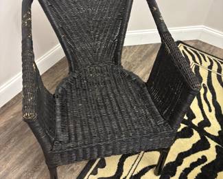 Dinning set: 4 black wicker chairs and Round glass table on metal base. $250.00 set. Tbl: 48” diameter 30” t. Chr: 23”w 17”d 30”t