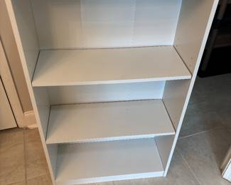 Black and white book cases. $20 each 24.5”w 9.5”d 40.5”t