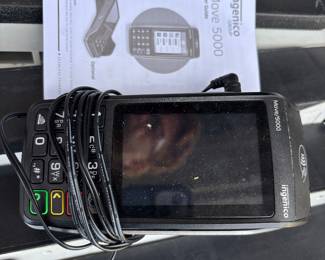 Ingenico Move 5000 credit card acceptance machine with receipt tape rolls. $100.00