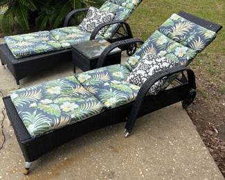 (2) Plastic Wicker Loungers & small table $250 set Lounger:24”w 78”l 21”t Table: 15”x 15” x 15”t