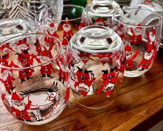 vintage Georges Briard Santa and Reindeer tumbler glass, likely dating from the 1960s or 1970s MCM