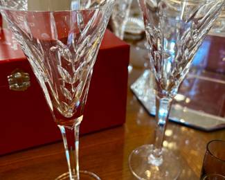 Waterford Crystal champagne flute from the "America's Heritage Collection" in the "Lincoln" pattern, which features intricate vertical cuts.