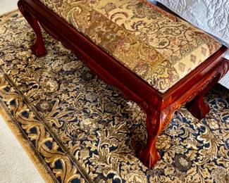Area rug and upholstered bench