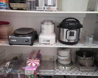 Lots of Small Kitchen Appliances and Utensils