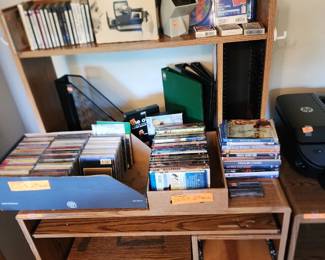 Small desk , pana-vue automatic lighted 2 x 2 slide viewer,  cos and dvds