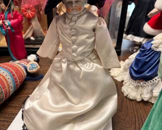 #116 - $80 - Lou Brown China Doll - 1890's or later -12"- molded black. 