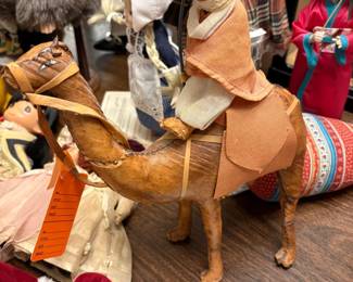 Handsewn leather camel with rider