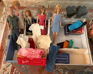 4 Barbie dolls, Ken Doll, & clothing (some originals) & Case