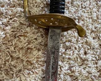 #29 - $100 -United States Marine sword marked with Star 