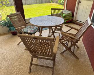 #31 - $150 - 4 teak fold up armchairs & round table 35"D