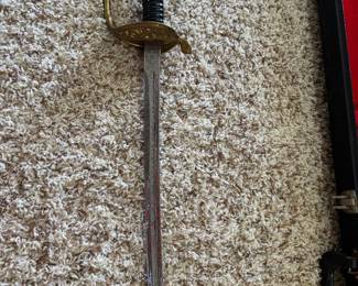 #29 - $100 -United States Marine sword marked with Star 