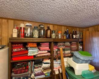 Vintage glass along the top shelf