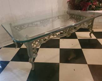 Wrought iron glass top coffee table. 