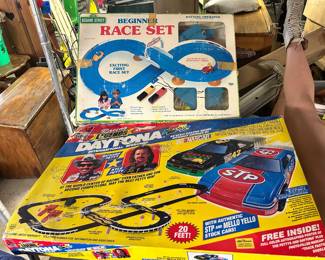 Racing Legends Daytona WITH TWO SLOT CARS & featuring Richard Petty & Kyle Petty. Sesame Street Beginners Racee Set WITH TWO SLOT CARS featuring Big Bird & Cookie Monster!.
