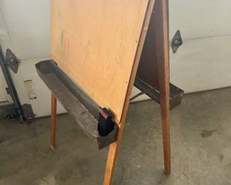 A vintage wooden art/chlkboard child's easel