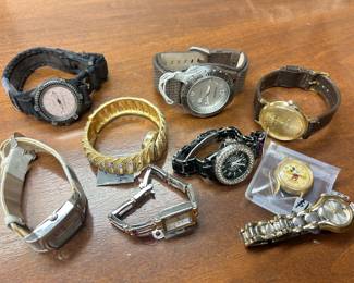 Assortment of miscellaneous watches, including another Mickey Mouse watch.