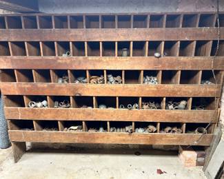 A multi bin bolt/plumbing workshop cabinet. With ALL the plumbing pieces!!!