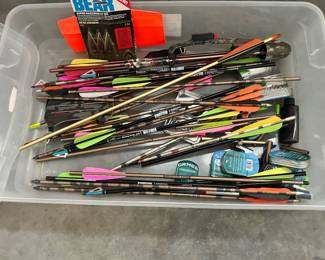 looks like a tub of aluminumand carbon hunting bow and crossbow arrows and various tips