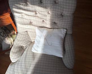 Tufted upholstered chair we have two of these