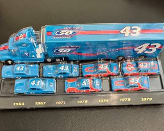 Item #7 - Richard Petty 50th Anniversary Hauler & Cars $32
