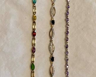 Item # 24 Multicolored bracelet $30/Item # 25 Sapphired colored bracelet $30 Item #Amethyst colored bracelet $30