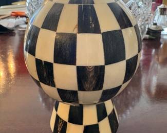 Horn and bone sphere on stand