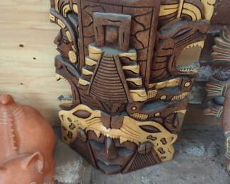 hand-carved wooden Mayan or Aztec style mask