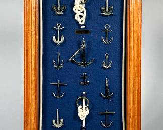 FRAMED SHADOWBOX OF MINIATURE NAUTICAL ANCHORS