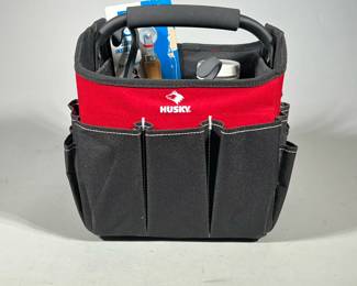HUSKY RED AND BLACK OPEN-TOP TOOL CADDY WITH ASSORTED NAILS AND HAND TOOLS