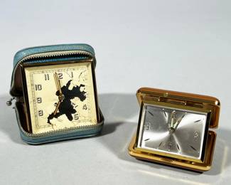PAIR OF VINTAGE FOLDING TRAVEL ALARM CLOCKS, SMITHS 7 JEWELS AND UNMARKED GOLD-TONE