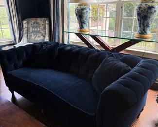 Pair of blue Maitland and Smith sofas, lamps, table