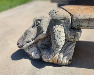 The creature depicted is an alligator