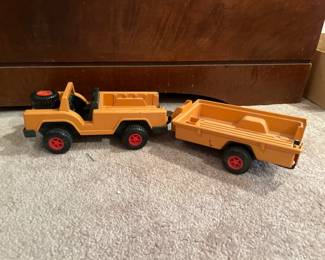 Plastic jeep and trailer
