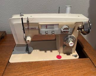 Close-up of dress paper, sewing machine