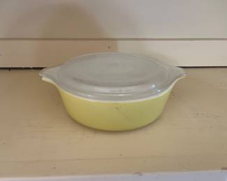 Yellow Pyrex casserole dish with Kevin