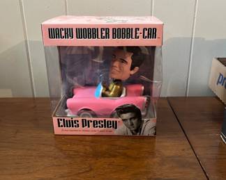 Elvis in pink Cadillac bobble head