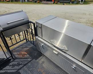 Features a large, heavy-duty main smoking chamber 