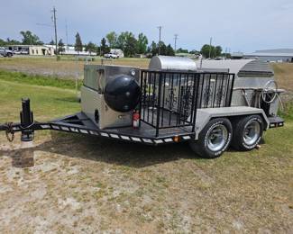 Custom-built tandem-axle BBQ smoker trailer