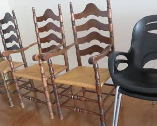 3 of 4 vintage ladderback rush seat chairs.