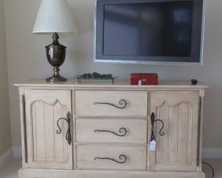 Custon cabinet with distressed cracked paint finish.